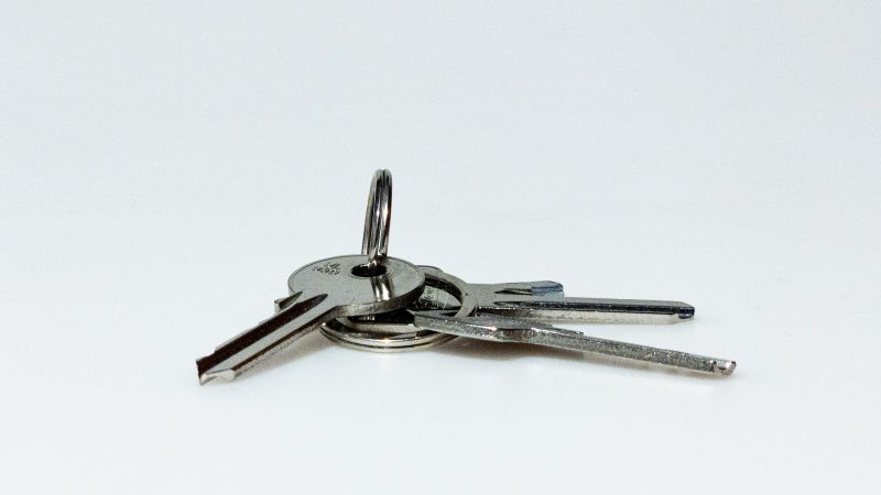 Three silver keys on a keyring
